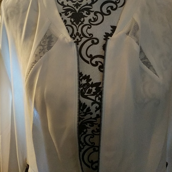 Cream colored sports meets couture zip up jacket. - Picture 2 of 4